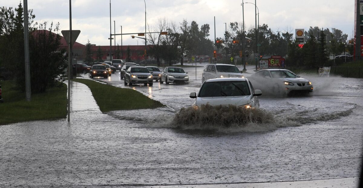 flooded road flood flooding storm nature rain water wet thunderstorm city